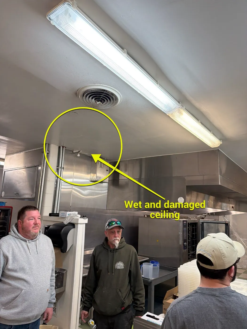 Sewage cleanup crew in PPE on-site in Highland Park, IN
